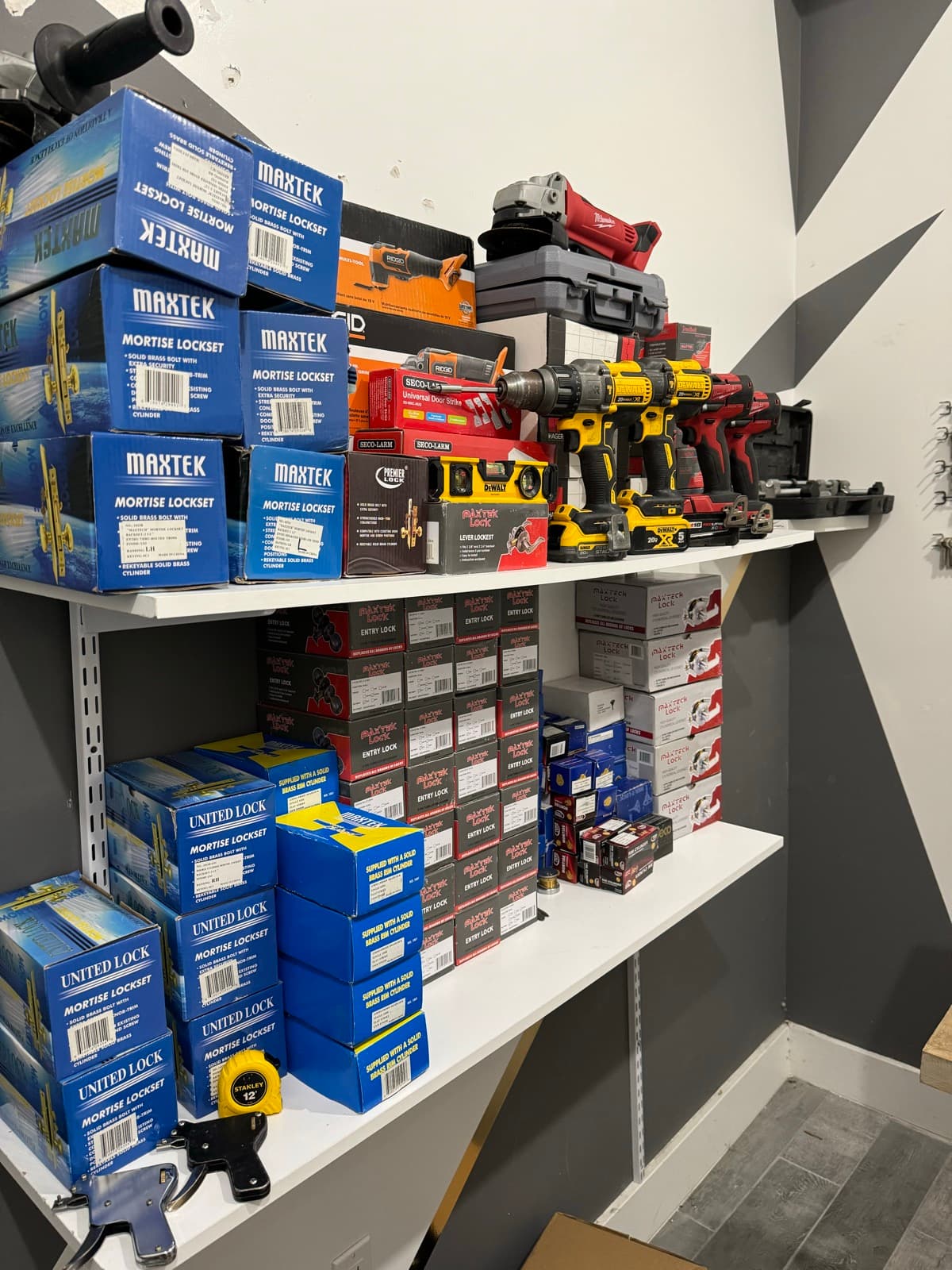 Shop bench with drills, levels and lock inventory at 812 President St