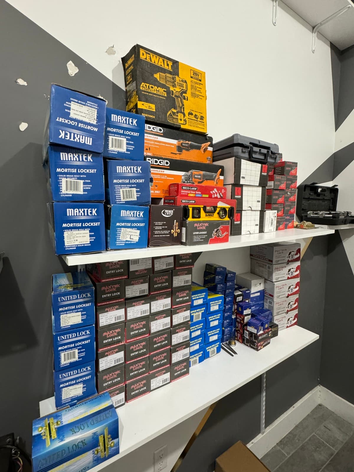 Shop shelves stocked with mortise locksets and entry locks at 812 President St