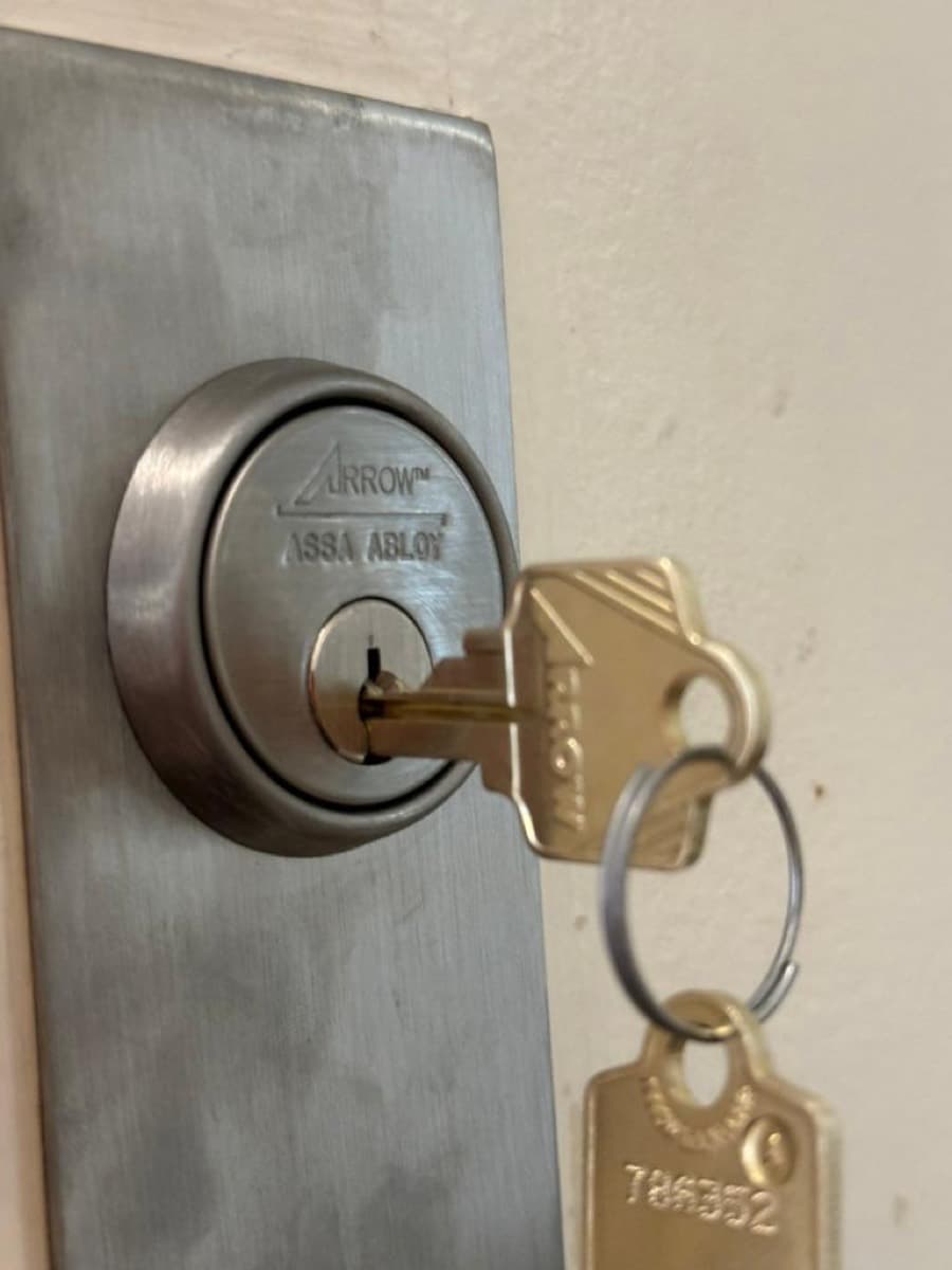 Arrow ASSA ABLOY cylinder with fresh keys after a rekey